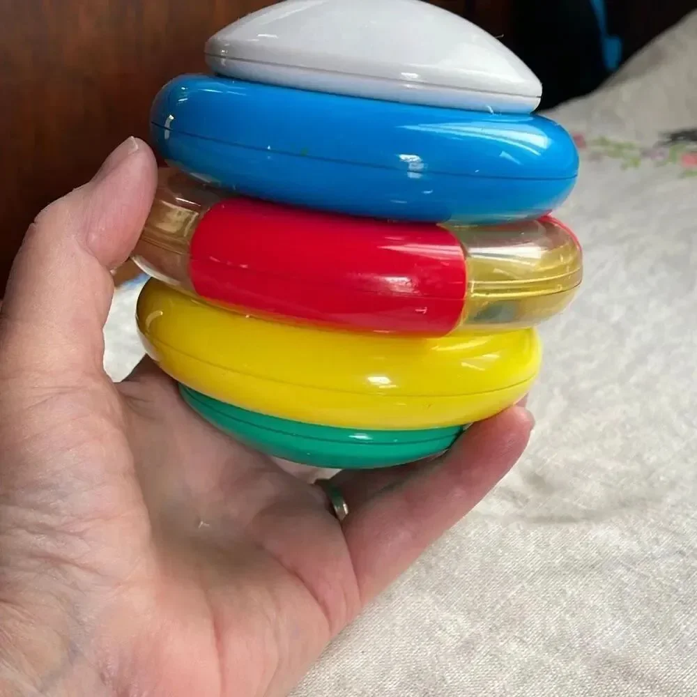 1996, Ring ‘n Roll Gerber Products Co. Toy Biz, Inc roundish rolling rattle infa